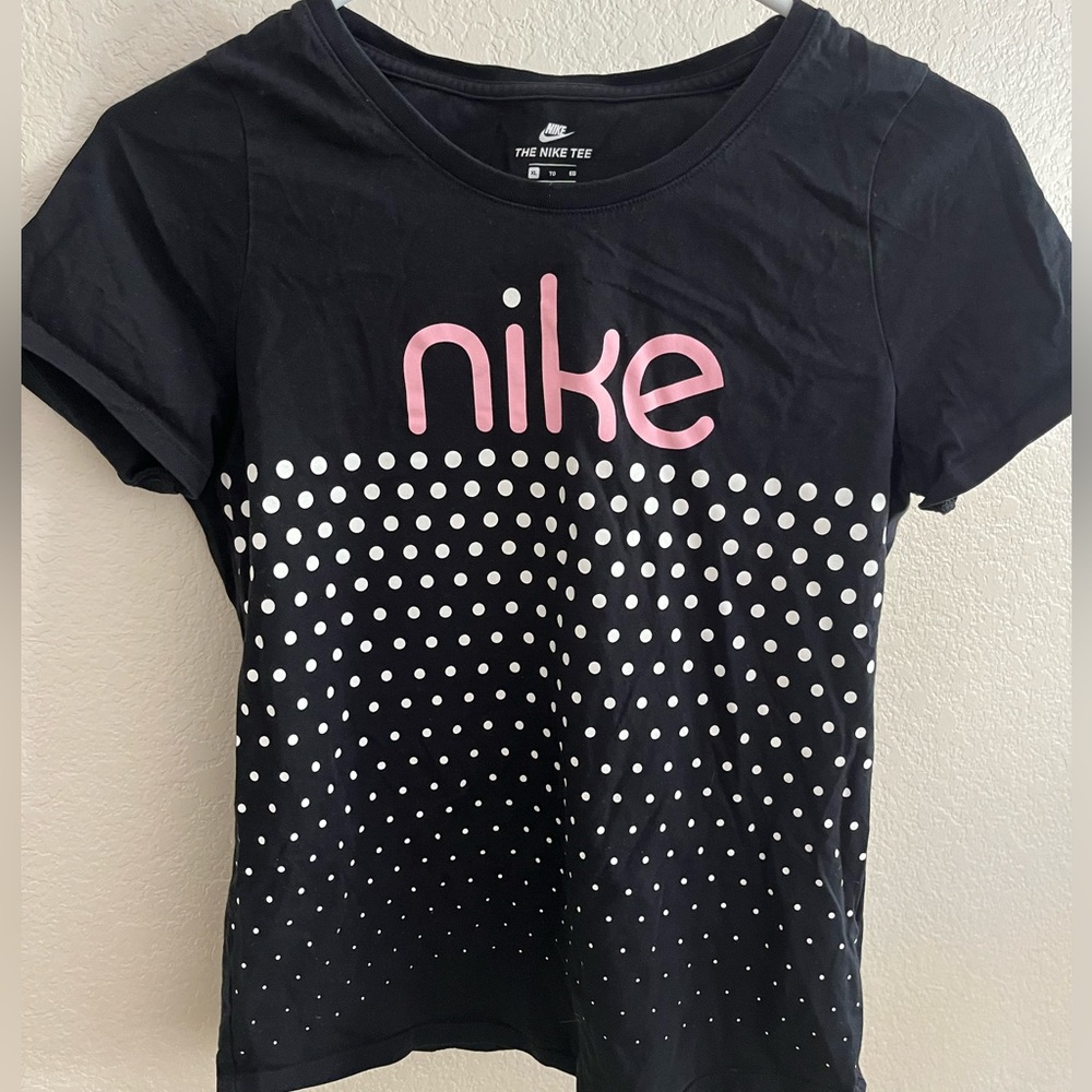 Nike girls tshirt with pink Nike logo/white polka dots. Size XL Cotton material.